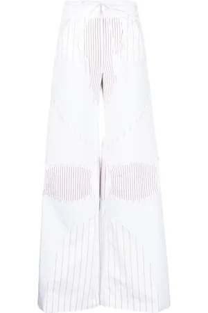 OFF-WHITE Pantalones anchos con motivo de rayas