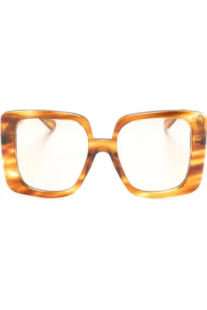 Gucci Lentes de sol con armazón oversize y placa del logo
