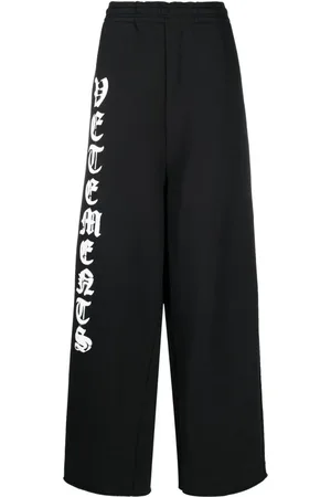 Vetements Pants anchos con logo estampado