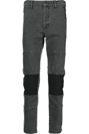 UNDERCOVER Jeans slim con tiro medio