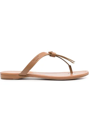 Kate Spade Mules con detalle de borlas