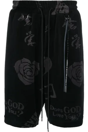 MASTERMIND JAPAN Shorts deportivos con rosa estampada