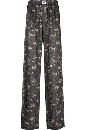 Natasha Zinko Pantalones anchos con varios estampados