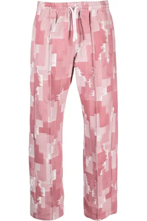 MARCELO BURLON Pantalones anchos con estampado geométrico
