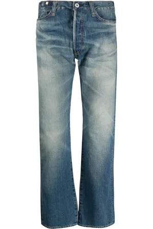 JUNYA WATANABE Jeans con detalles de x Jean-Michel Basquiat