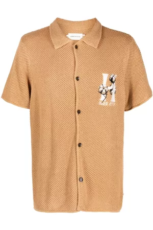 HONOR THE GIFT Playera tipo polo con logo estampado