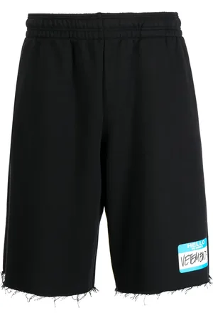 Vetements Shorts deportivos con bordes deshilachados y logo estampado