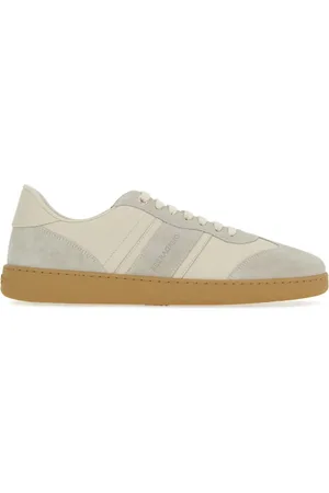 Salvatore Ferragamo Tenis bajos con logo en relieve