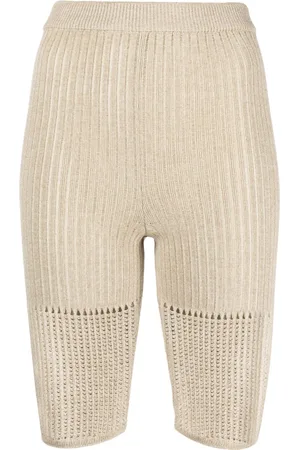 Nanushka Shorts biker con tiro alto