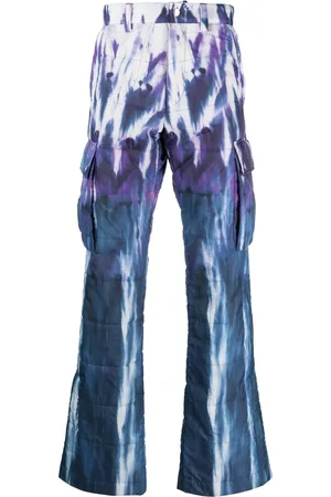 AMIRI Pantalones capitonados con estampado tie-dye