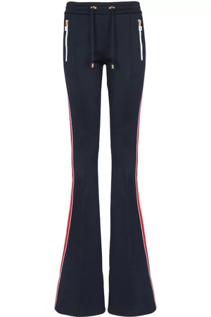 Balmain Pantalones acampanados con rayas laterales