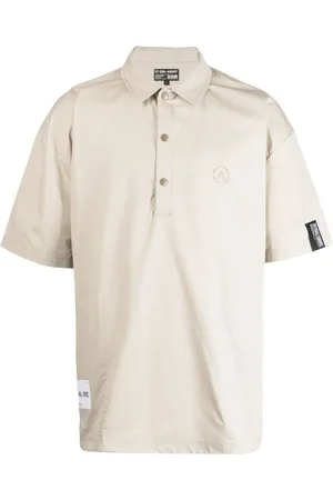Izzue Playera tipo polo con logo bordado