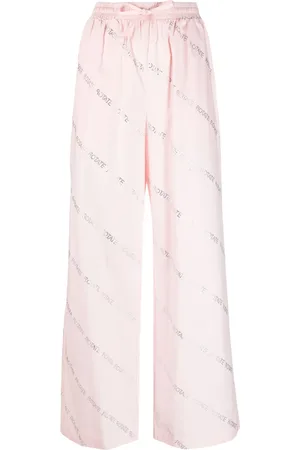 ROTATE Pantalones con motivo de logo