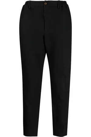 Comme des Garçons Pantalones tapered con motivo chevron