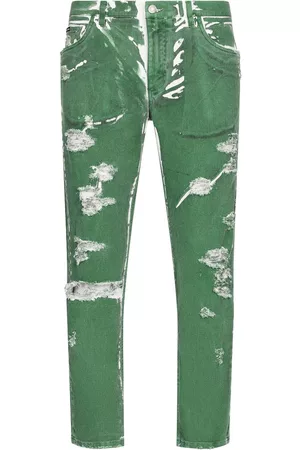 Dolce & Gabbana Hombre Skinny - Jeans con detalles rasgados y parche del logo