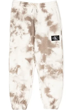 Calvin Klein Pants con parche del logo y efecto blanqueado