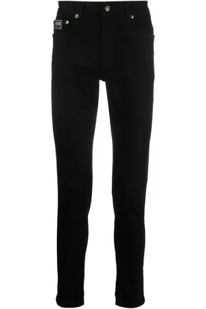 VERSACE Pantalones con parche del logo
