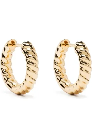 Anita Aretes huggie Zoe en oro amarillo de 18kt