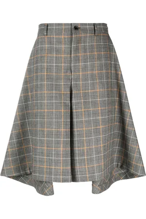 Comme des Garçons Shorts asimétricos con pinzas