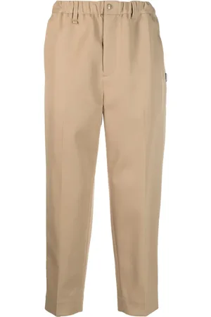NEIGHBORHOOD Pantalones tapered con parche del logo