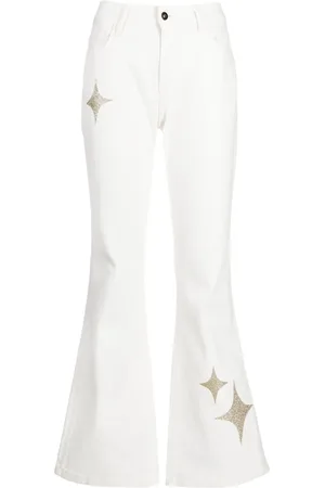 Madison.Maison Jeans acampanados con tiro alto y estrellas estampadas