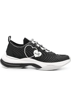 Moschino Tenis bajos con corazones estampados