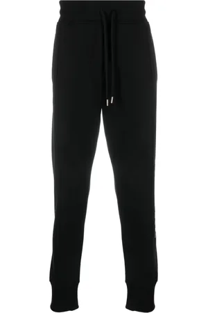 VERSACE Pants con logo estampado