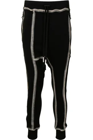 11 BY BORIS BIDJAN SABERI Pantalones con detalles de costuras