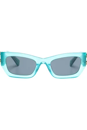 Miu Miu Lentes del sol con placa del logo en el brazo