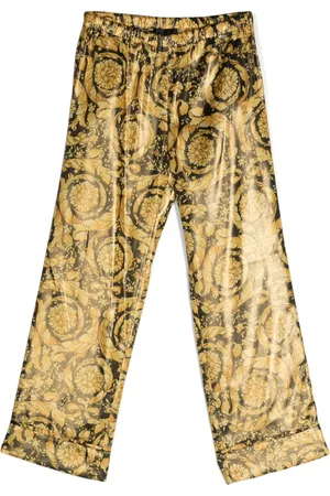 VERSACE Pantalones con estampado Barocco