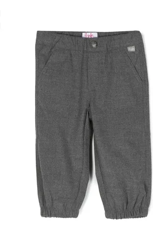 Il gufo Pantalones con parche del logo