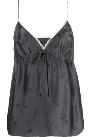 Dorothee Schumacher Top sin mangas con motivo floral y cordones