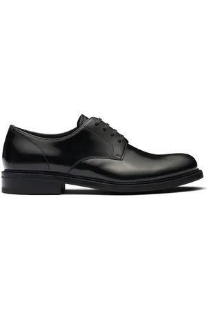 Prada Zapatos derby con logo en relieve