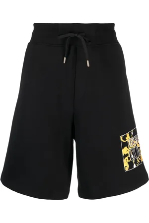 VERSACE Shorts con estampado Barocco