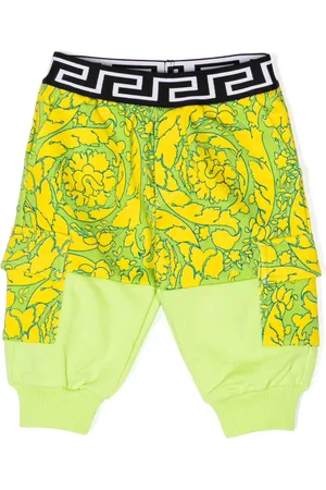 VERSACE Pantalones con estampado Barocco