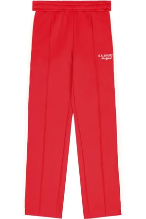 Sporty & Rich Pants con detalle de rayas
