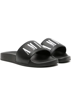 AMIRI Flip flops con logo estampado
