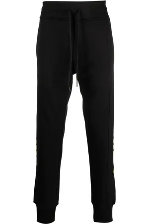 VERSACE Pants con cadenas estampadas