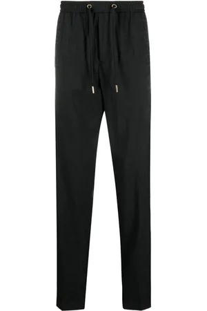 VERSACE Pants con motivo Allover
