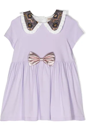 HUCKLEBONES LONDON Vestido con volantes en el cuello y detalle de moño