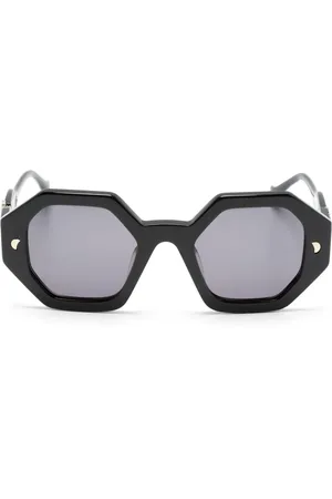Nanushka Lentes de sol con armazón hexagonal y placa del logo