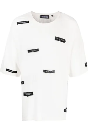 MOSTLY HEARD RARELY SEEN Playera con parche del logo