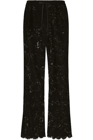 Dolce & Gabbana Pantalones semitransparentes con panel de encaje
