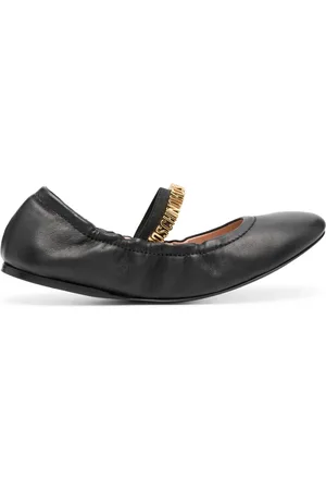 Moschino Flats con placa del logo