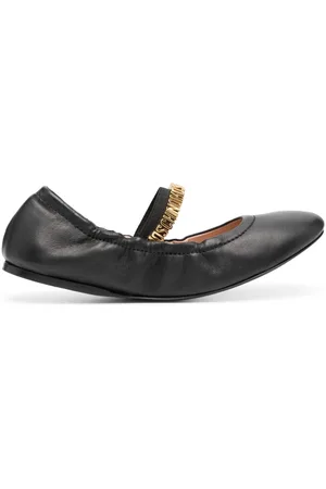 Moschino Flats con placa del logo