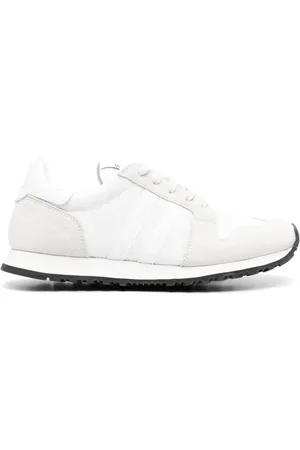 Comme des Garçons Tenis con parche del logo