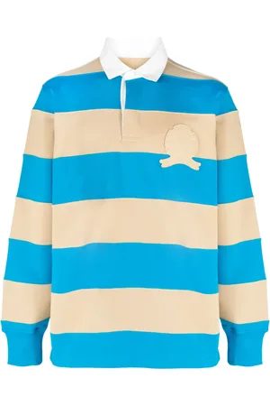 Tommy Hilfiger Playera tipo polo con parche del logo y motivo de rayas