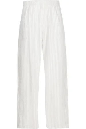 CRAIG GREEN Pantalones rectos con rayas estampadas