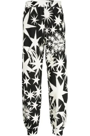 UNDERCOVER Pants con estrellas estampadas