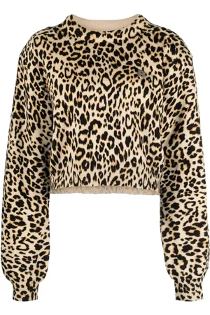 ROTATE Suéter corto con estampado de leopardo